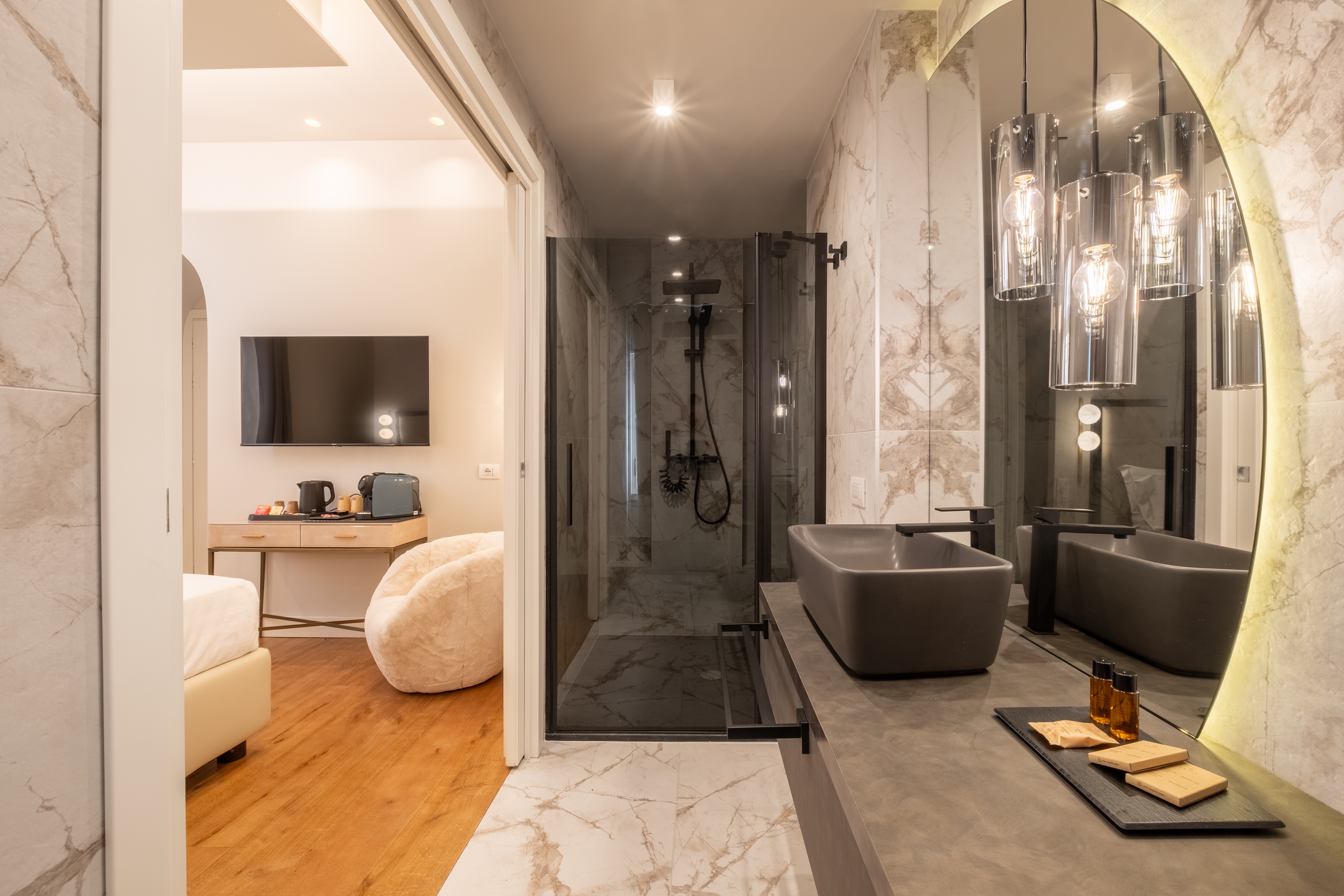Bathroom vanity with vessel sinks and pendant lights